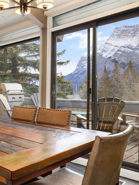 Cozy and bright mountain resort condo suite interior perfect for families visiting Banff.