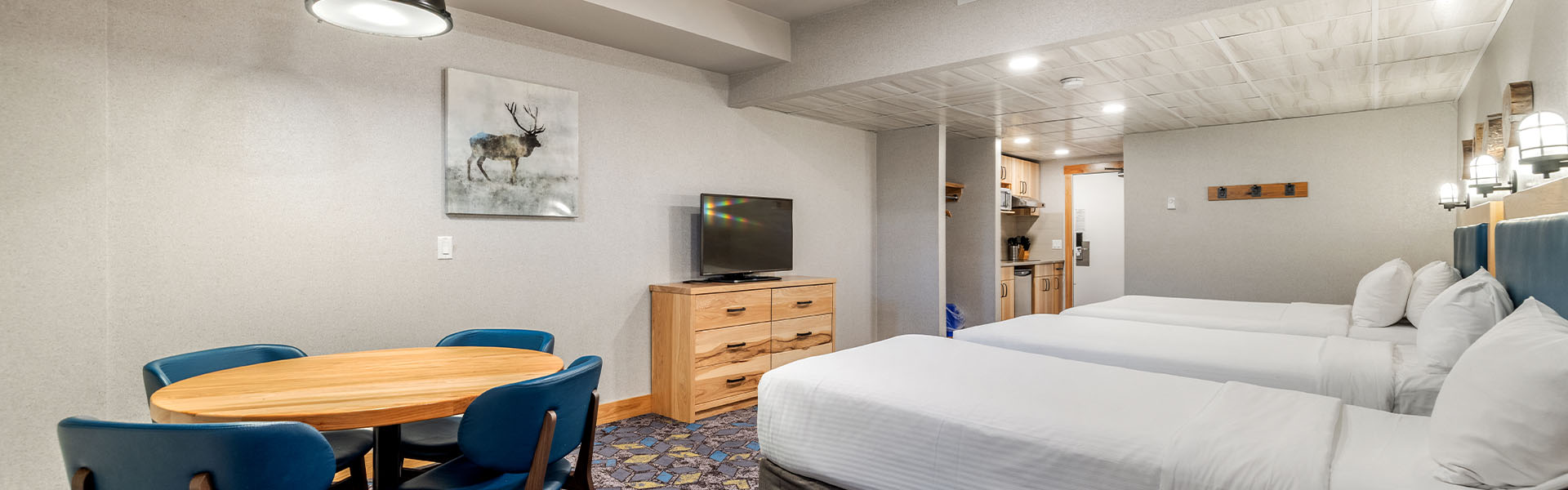 Beds inside a Standard Suite at Tunnel Mountain Resort in Banff.